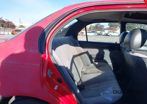 1996 Toyota Corolla z USA, uszkodzony, nr VIN 1NXBA02E5TZ381433